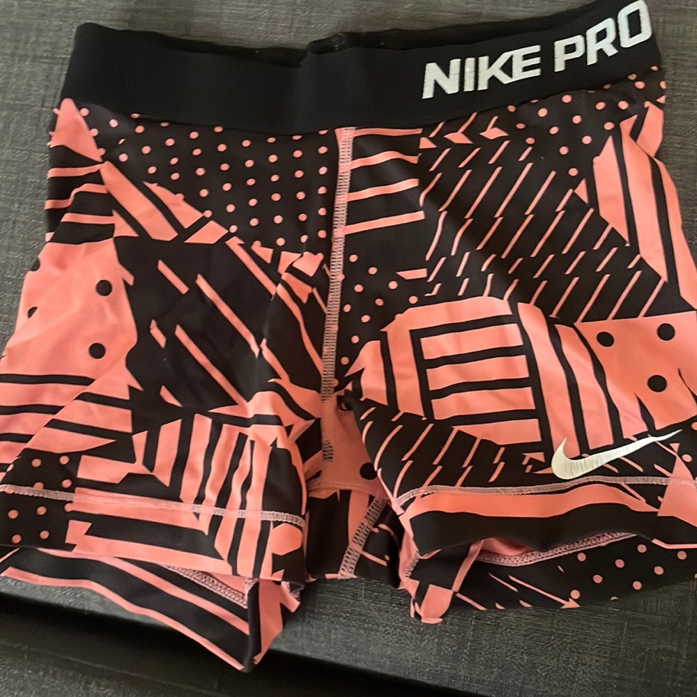 Women's coral and black Nike spandex